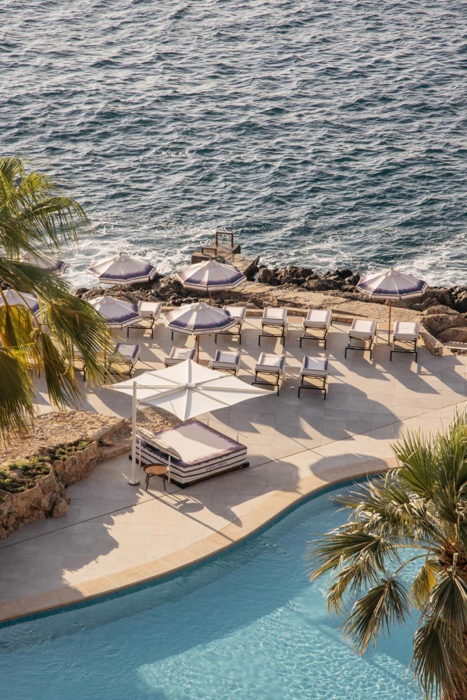 The Hotel de Mar pool leaning over the Mediterranean